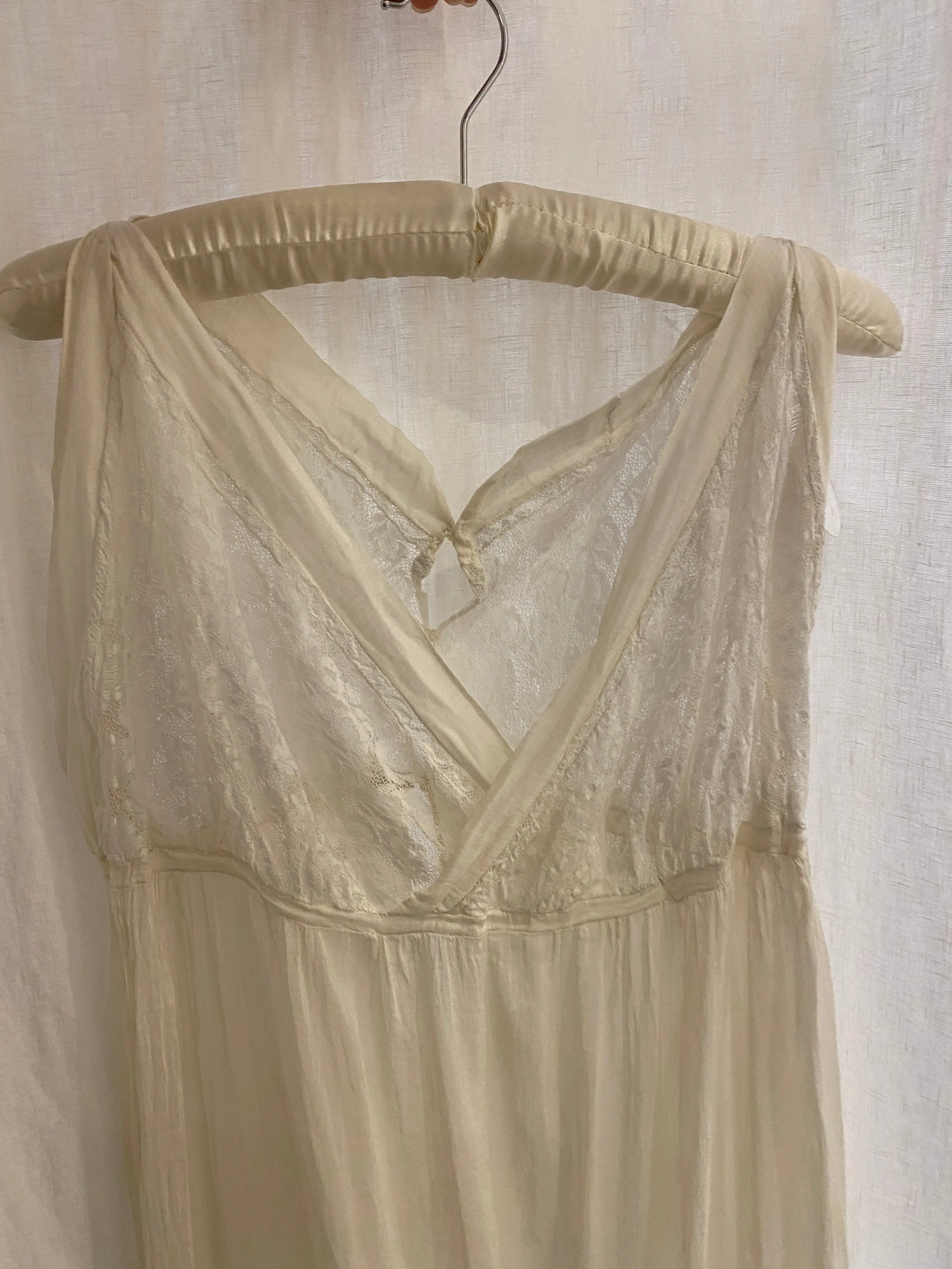 1920s Sheer Cream Silk and Lace Dress with Button Closure.