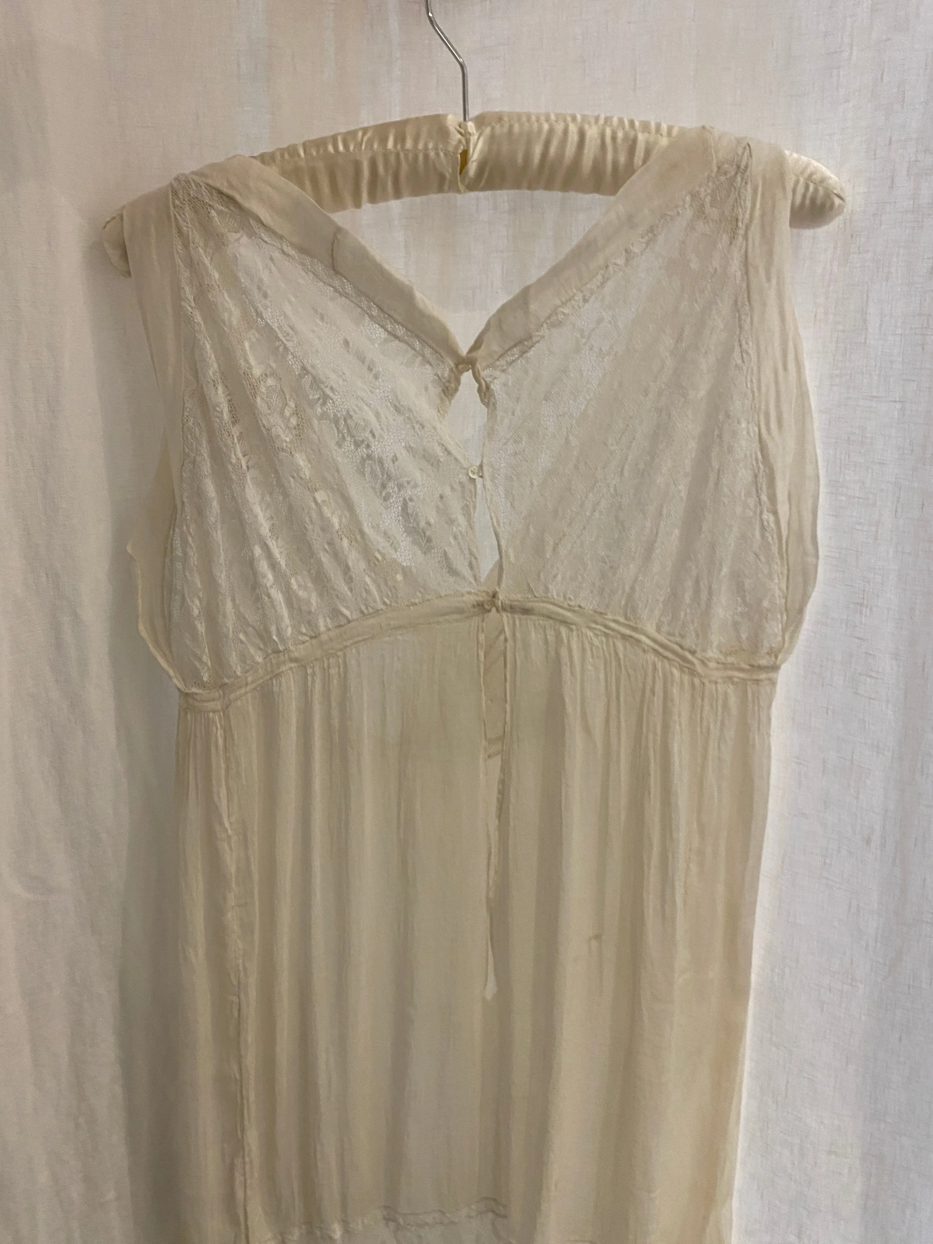 1920s Sheer Cream Silk and Lace Dress with Button Closure.